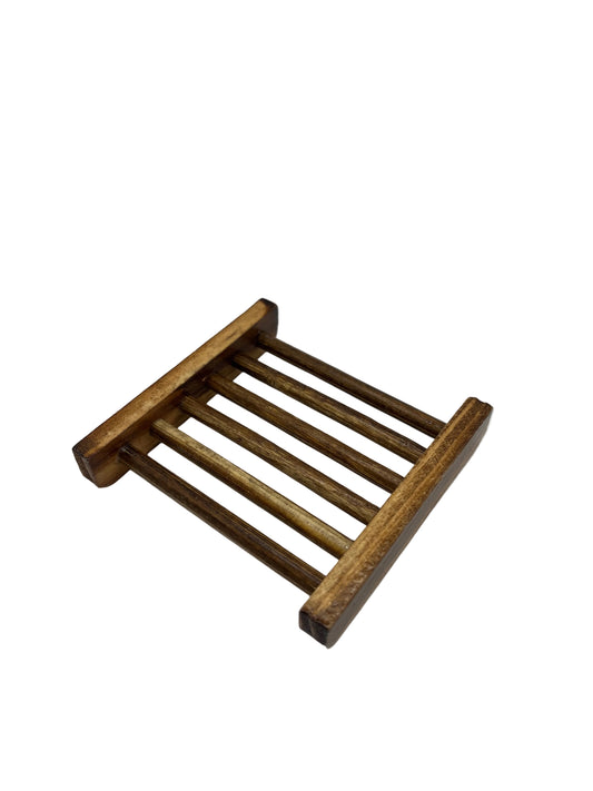 Wooden soap dish on a white background