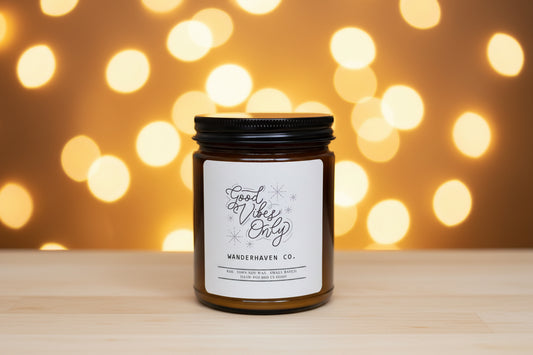 Amber had candle on a twinkle lit background 