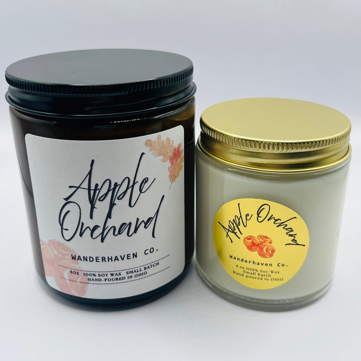 8 oz amber jar , white label, apple orchard wit apples and leaves on the label. Small 4 oz Jar has a gold lid with clear glass gar and circle old label with apples and apple orchard written across